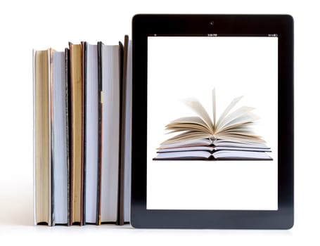 Books and  tablet computer isolated on white, digital library concept,