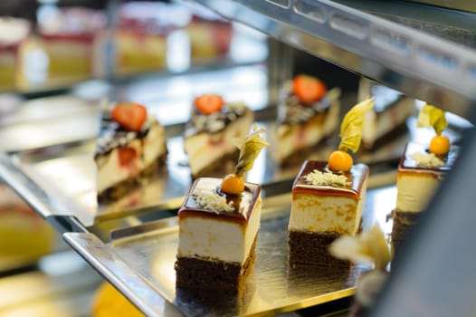 Cake and pastry in window display canteen food dessert tasty