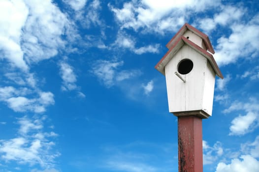 birdhouse with blue sky