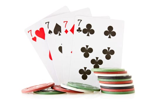 Cards and chips for poker on white background