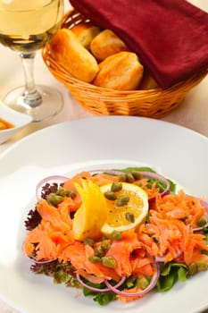Delicious salmon salad and cappers