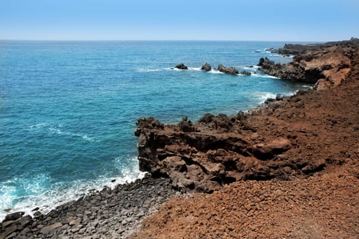 Lanzarote Punta del volcan Atlantic sea in canary Islands