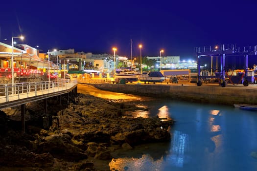Lanzarote Puerto del Carmen harbour night view in Canary Islands