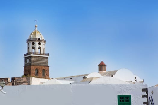 Lanzarote Teguise white village with church tower in Canary Islands