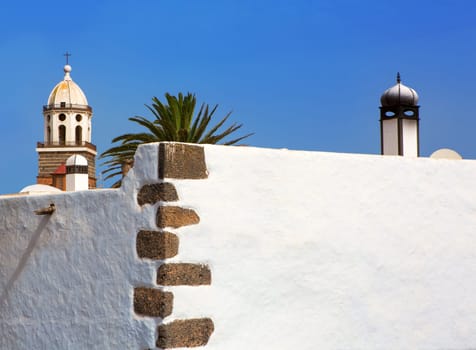 Lanzarote Teguise white village with church tower in Canary Islands