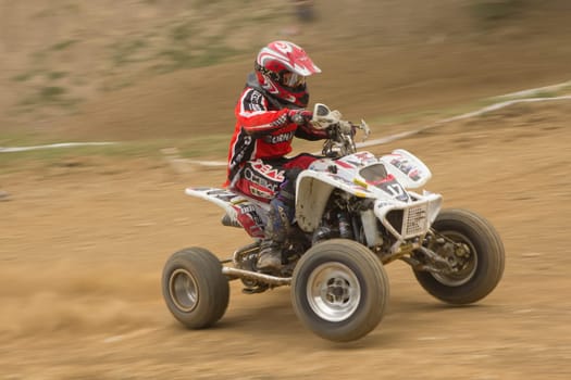 MOHELNICE,  CZECH REPUBLIC - SEPTEMBER 08: Unidentified racer rides a white quad motorbike in the "International Championship of the Czech Republic 2012"" on September 08, 2012 in MOHELNICE, Czech Republic."