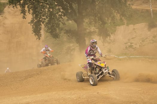 MOHELNICE,  CZECH REPUBLIC - SEPTEMBER 08: Two riders in a quad motorbike race. "International Championship of the Czech Republic 2012"" on September 08, 2012 in MOHELNICE, Czech Republic."