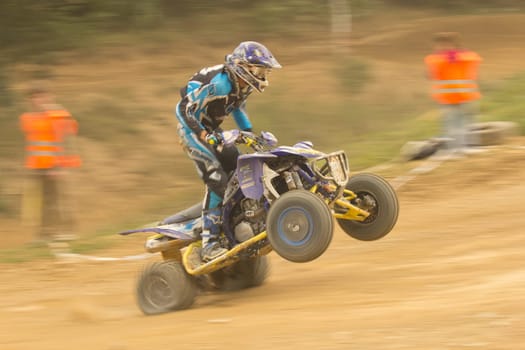 MOHELNICE,  CZECH REPUBLIC - SEPTEMBER 08: Dynamic shot of rider in the quad jump in the "International Championship of the Czech Republic 2012"" on September 08, 2012 in MOHELNICE, Czech Republic."