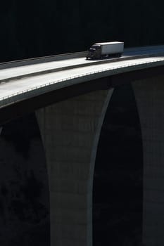 Semi trailer truck crossing a high level bridge in British Columbia, Canada