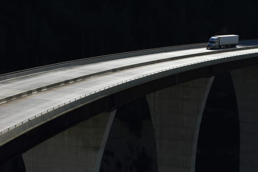 Semi trailer truck crossing a high level bridge in British Columbia, Canada