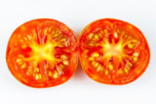 Half a tomato isolated on a white background