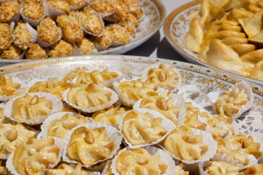 Variation of moroccan pastries in elegant dishes.