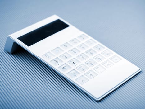 White Calculator On Office Desk