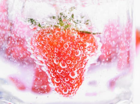 Fresh Strawberry in Mineral water with boobles