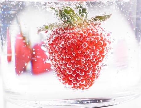 Fresh Strawberry in Mineral water with boobles