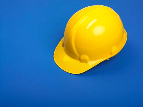 Yellow Hardhat hard hat Helmet on Blue