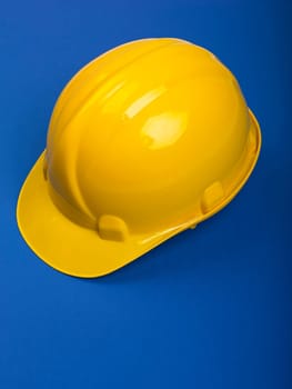 HYellow ardhat hard hat Helmet on Blue
