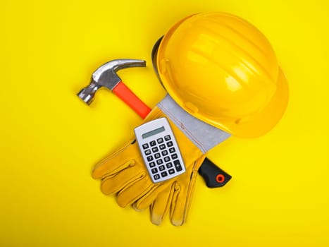 Ready fgor building site - HardHat Hammer Gloves Calculator on white