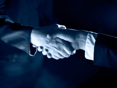 Handshake Handshaking dark and light