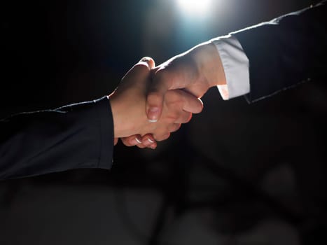 Handshake Handshaking light and dark