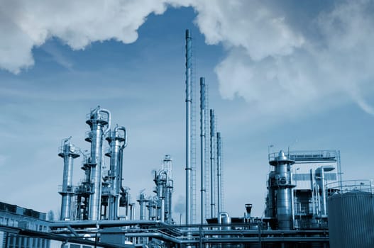 oil and gas industry, refinery and in a blue toning concept