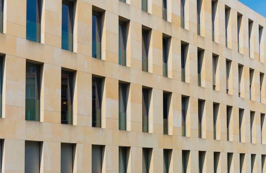 facade of a modern office building with similar windows