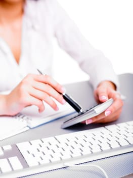 Office worker woman calculating with calculator
