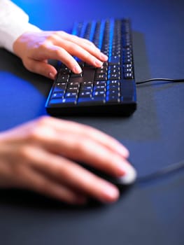 Business Secretary Typing on Computer Keyboard