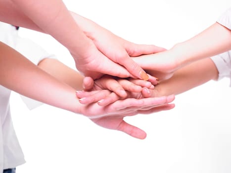 Business team join hands on white background