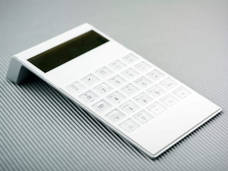 White Calculator On Office Desk