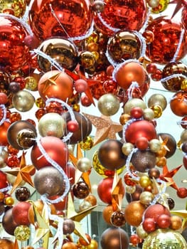 Christmas baubles hanging form a ceiling