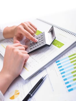 Analyzing Business Data - pen and numbers on paper