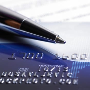 Close up a credit card and pen