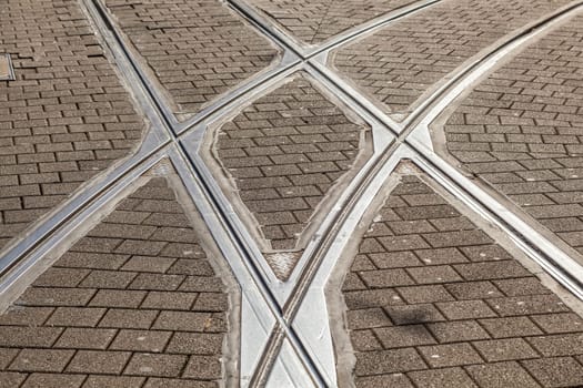 rails of streetcar in old cobble stone street