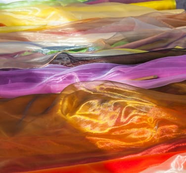 shawls in harmonic colorsat the market
