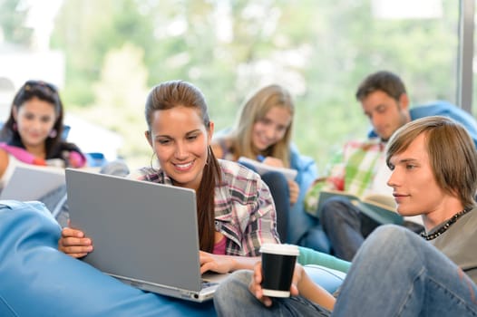 Students working on project in study room high-school teens laptop