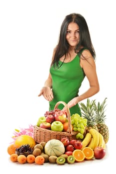 Young woman with variety of fruits in wicker basket isolated on white