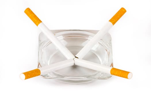 Color photo of filter cigarettes isolated background in an ashtray