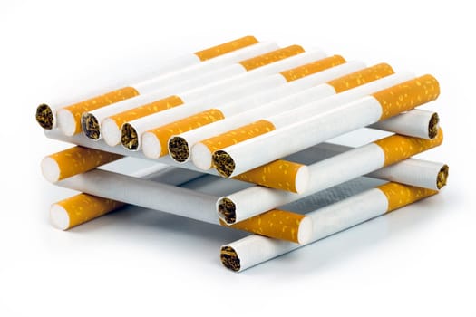Color photo of filter cigarettes isolated background, forming a house.