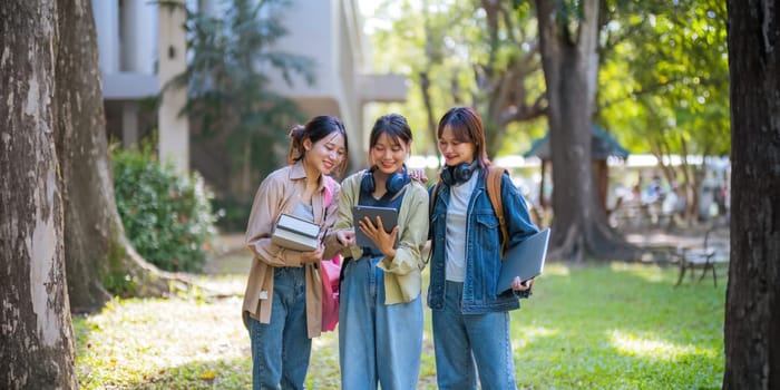 Student university friendship concept with classmate walking together at campus college park. Youth teenage and education.