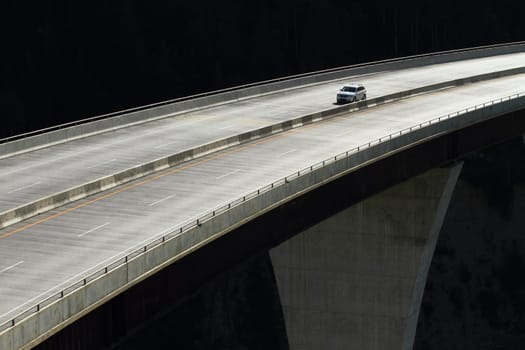 Single car crossing a high level bridge in British Columbia