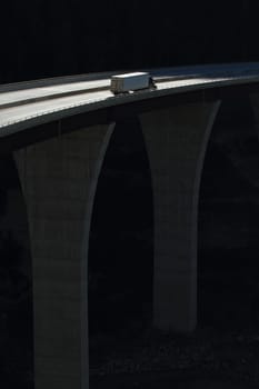 Semi-trailer truck crossing a high level bridge in British Columbia