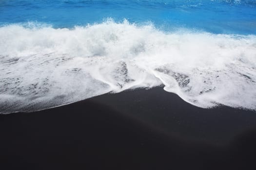 Black sand beach volcanic in Tenerife at Canary Islands