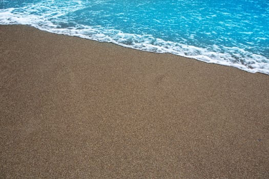 beach tropical shore with brown sand and clear water wave