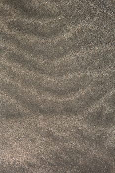 Canary Islands brown beach sand texture closeup macro