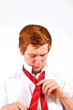 attractive  teenager  binding his tie