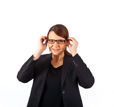 Business woman smiling and looking serious isolated on white