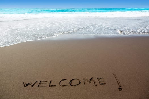 Brown sand beach with written word Welcome in Canary Islands