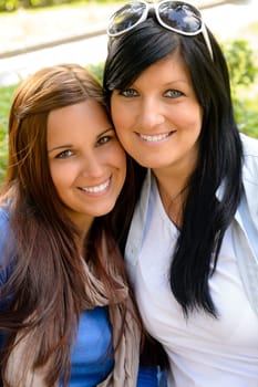 Mother and daughter spending free time outdoors teen family happy