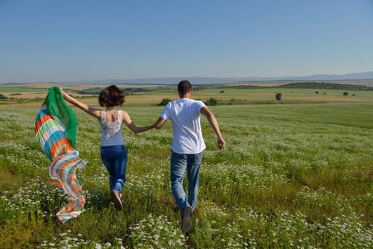 happy young couple in love have romance and fun at wheat field in summer